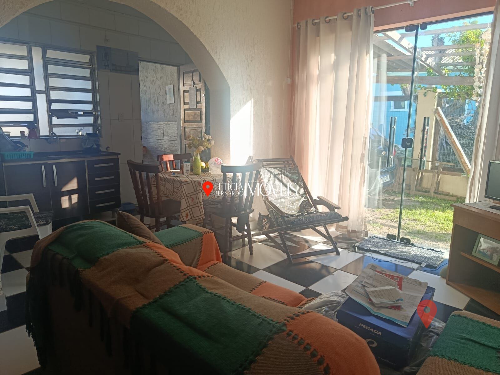 Casa à venda no bairro Centro em Balneário Pinhal/RS — foto 1