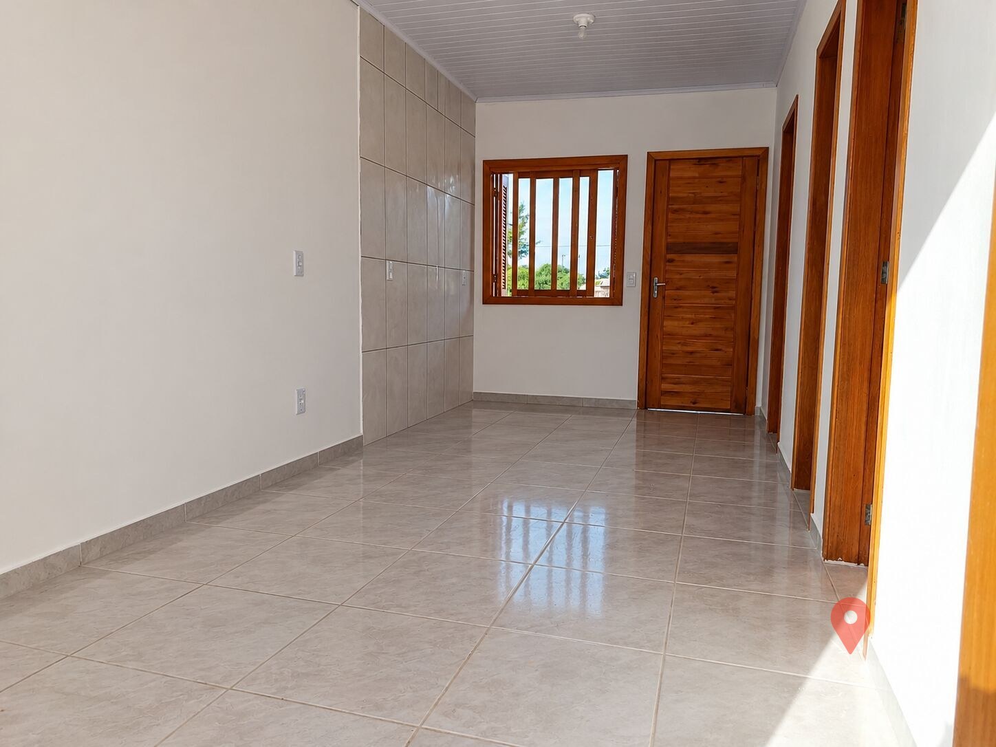 Casa à venda no bairro Centro em Balneário Pinhal/RS — foto 1